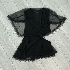 Beautiful lace and chiffon cutout top. BCBG size 4